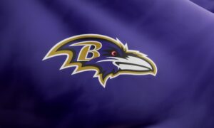 NFL team Baltimore Ravens logo on waving jersey fabric. Editorial 3D rendering